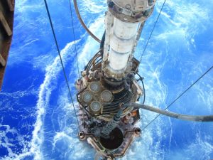A Subsea BOP being lowered from the Moonpool on an offshore oil rig